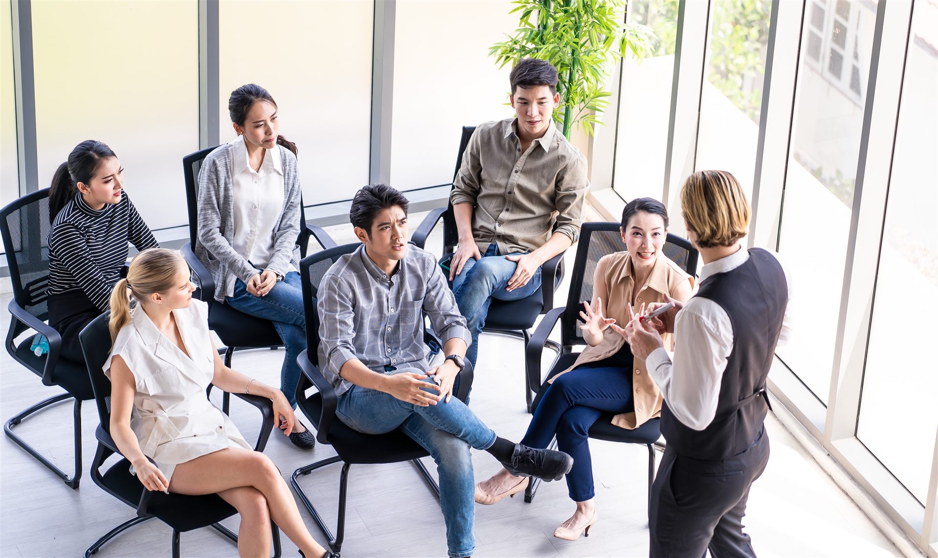 Group learning discussion in a bright office